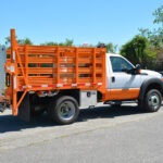fleet-and-municipal-platform-and-stake-dejana-9-ft-rack-truck-with-liftgate-1